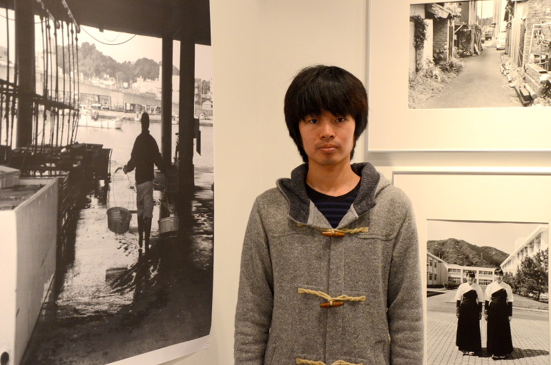 「来場者から自分でも気づかなかったことを言ってもらえるのがうれしい」と話す吉川恭平さん=東京都新宿区のコニカミノルタプラザで、中嶋真希撮影