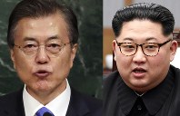 South Korean President Moon Jae-in, left, and North Korean Leader Kim Jong Un (AP)