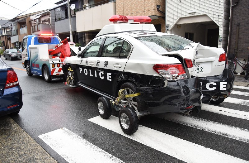 Police fire 7 shots at 2 suspicious cars in Osaka; driver held with ...