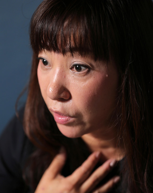 質問に答える安田純平さんの妻、深結さん=東京都千代田区で2018年10月19日、宮武祐希撮影
