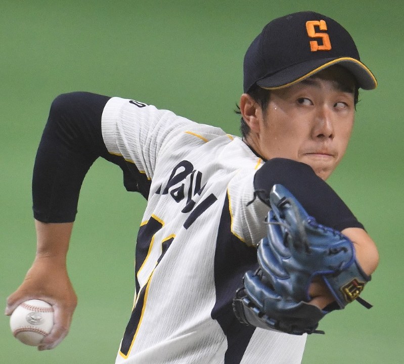 今夏の都市対抗で力投する野口