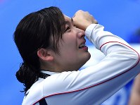 アジア大会。競泳女子５０メートル自由形の優勝で６冠を達成し、涙を流す池江璃花子＝ジャカルタで２０１８年８月２４日、宮間俊樹撮影