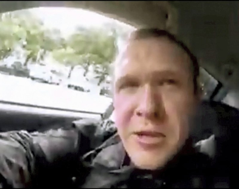 容疑者の男が自らネットで事件を中継したとみられる動画。車を運転する様子が映っている=ソーシャルメディアの投稿から15日、ロイター