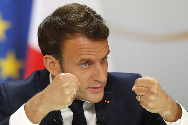 Macron offers tax cut to French workers to quell anger - The Mainichi