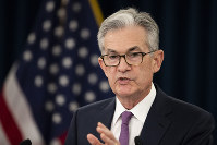 金融政策について語るFRBのパウエル議長＝米ワシントンで6月19日、AP