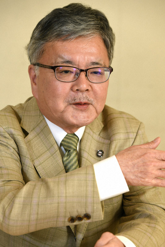 与良正男専門編集委員