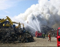 東日本大震災の災害ごみが山積みになっている仮置き場で起きた火災=宮城県名取市で、撮影日時不明(同県提供)