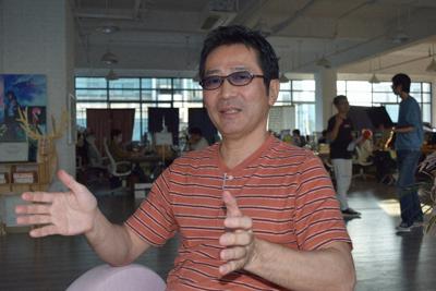 「漫画家と編集者の二人三脚が日本の漫画文化を支えている」と語る御木基宏さん＝中国福建省アモイで２０１９年１１月１１日午後４時３分、河津啓介撮影