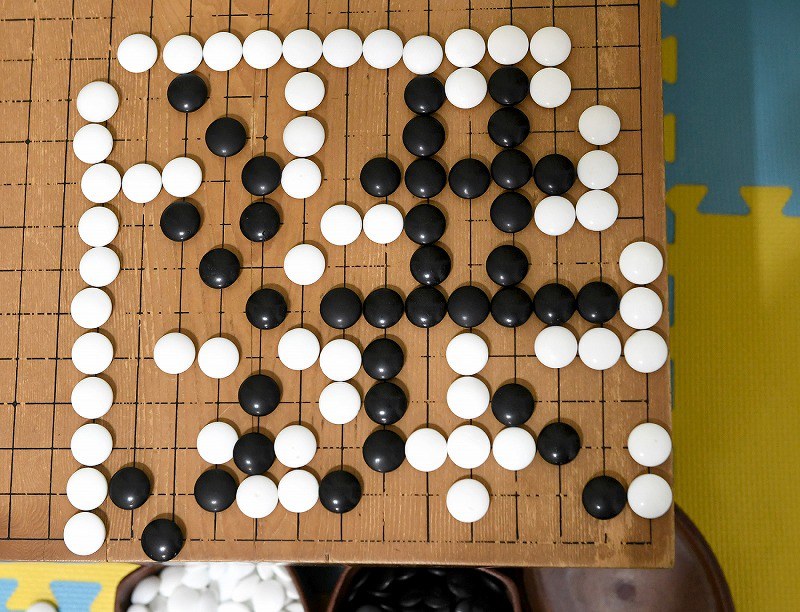 読む写真：Photo 次に光るのは私 プロ輩出の囲碁道場 [写真特集11