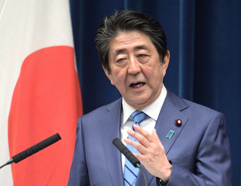 記者会見で新型コロナウイルス感染症への対応や改正新型インフルエンザ等対策特別措置法について説明する安倍晋三首相=首相官邸で2020年3月14日午後6時15分、川田雅浩撮影