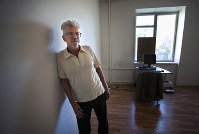 In this July 31, 2012 file photo, Eduard Limonov, long time radical activist, former leader of the banned National Bolshevik Party speaks to The Associated Press in Moscow, Russia. (AP Photo/Alexander Zemlianichenko)