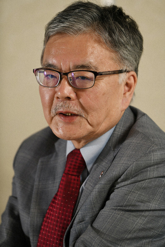 与良正男専門編集委員