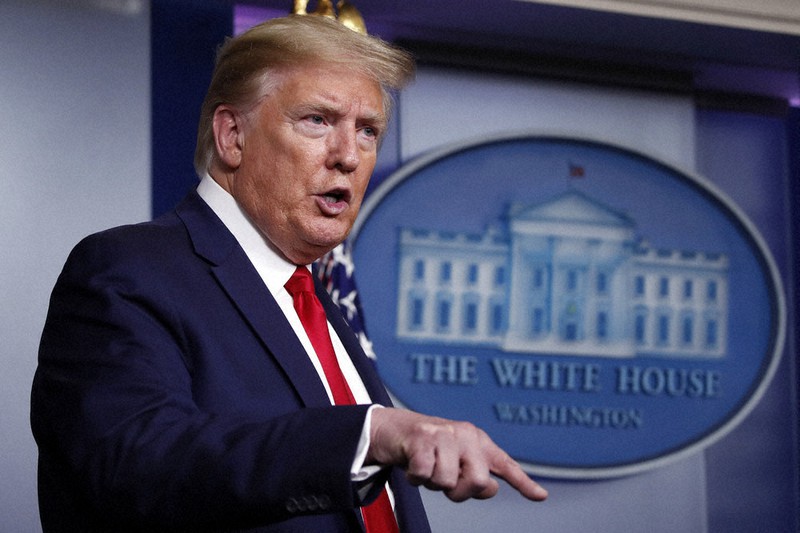 記者会見をするトランプ米大統領=ホワイトハウスで22日、AP
