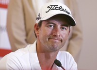 In this Nov. 27, 2013, file photo, Australia's Adam Scott addresses the media ahead of the Australian Open golf tournament in Sydney. (AP Photo/Rick Rycroft)