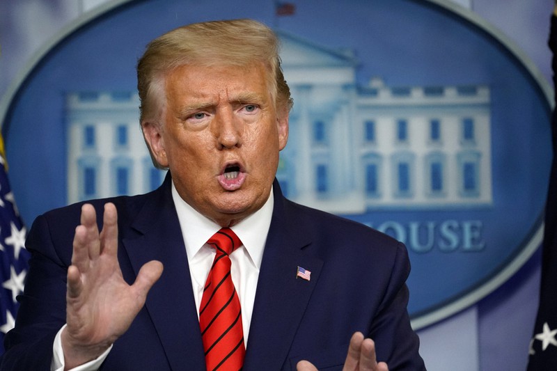 記者会見でコロナ対策などの質問に答えるトランプ米大統領=米ワシントン・ホワイトハウスで8月31日、AP