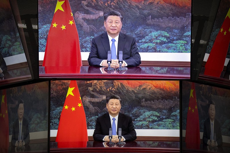 中国・上海で開かれた中国国際輸入博覧会のオープニングセレモニーで演説する習近平国家主席のテレビ映像=2020年11月4日、AP