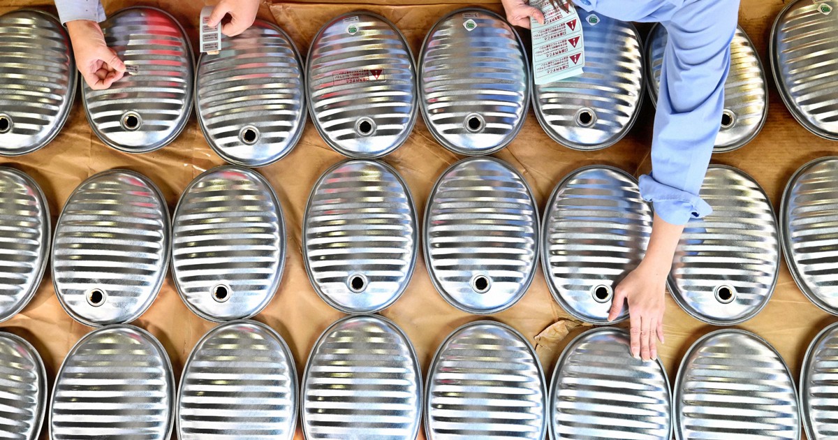 Japan Photo Journal Metal hotwater bottle production at peak for