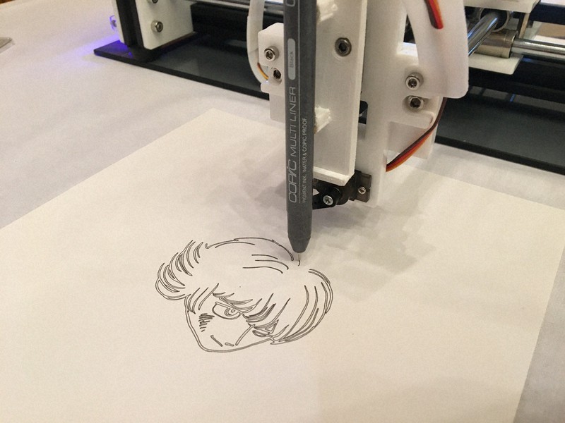 AIのデータをもとに、ロボットアームで描かれた「ぱいどん」=東京都文京区で2020年2月、高橋祐貴撮影