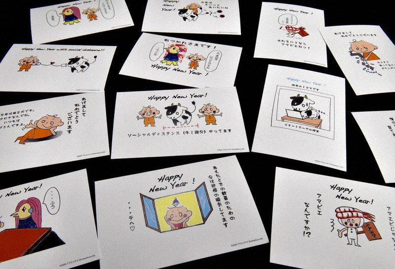 コロナ禍の生活をユニークに描いた印刷会社「白橋」のオリジナル年賀状=田鍋公也撮影
