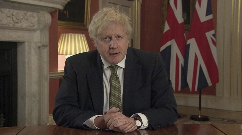 国民向けのテレビ演説で、ロックダウン措置について説明するジョンソン英首相=ロンドンで2021年1月4日、AP
