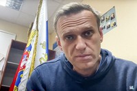 In this image taken from video released by Navalny Life youtube channel, Russian opposition leader Alexei Navalny speaks as he waits for a court hearing in a police station in Khimki, outside in Moscow, Russia, on Jan. 18, 2021. (Navalny Life youtube channel via AP)