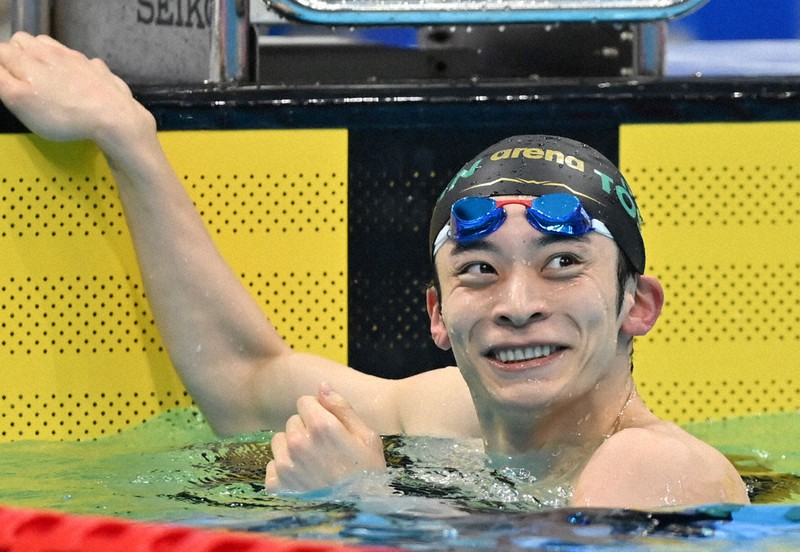 昨年12月の日本選手権で男子200メートル背泳ぎ決勝を制し笑顔の入江陵介=宮間俊樹撮影