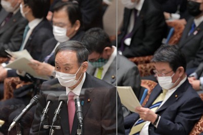 衆院予算委員会で答弁する菅義偉首相（手前左）＝国会内で2021年3月2日午前9時15分、竹内幹撮影