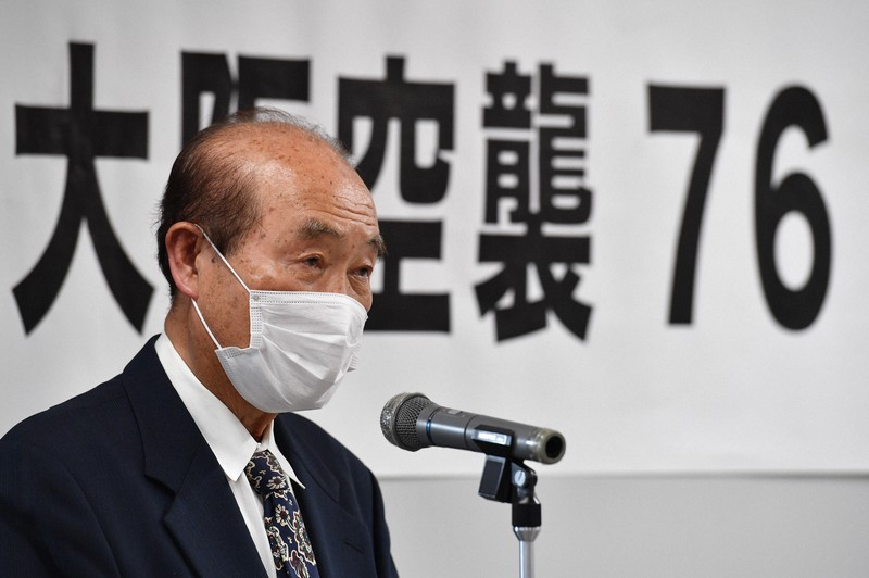 大阪空襲76年朝鮮人犠牲者追悼集会で、報告をする金禎文さん=大阪市北区で2021年3月13日午後2時52分、望月亮一撮影