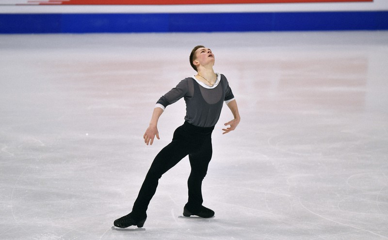 【フィギュアスケート世界選手権】男子フリーで演技するミハイル・コリヤダ=ストックホルムで2021年3月27日、AP