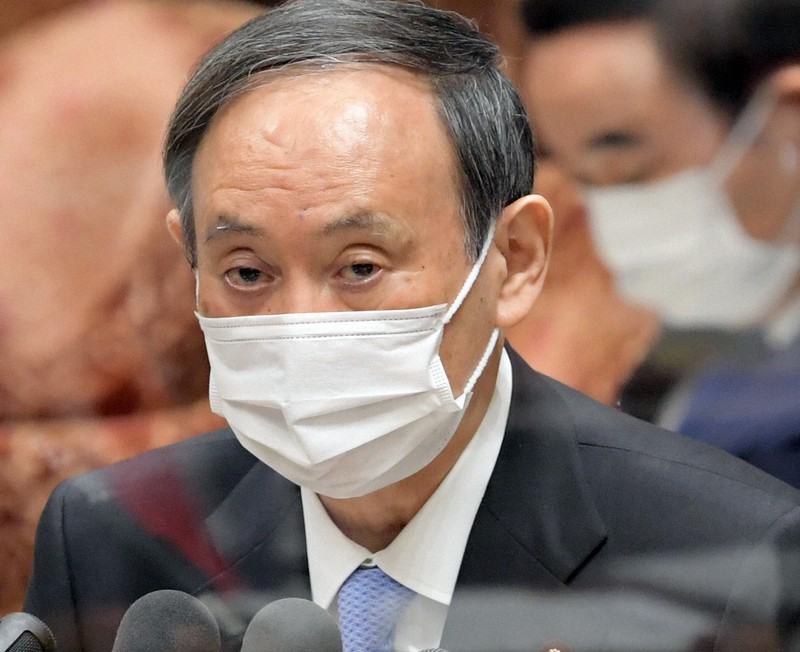 衆院決算行政監視委員会で自民党の田中英之氏の質問に答える菅義偉首相=国会内で2021年4月12日午前9時14分、竹内幹撮影