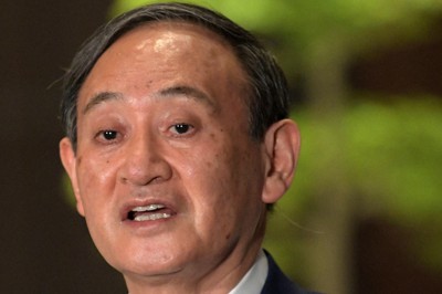 新型コロナウイルス感染症対策の関係閣僚会合を終え、記者団の質問に答える菅義偉首相＝首相官邸で2021年5月20日午後7時58分、竹内幹撮影