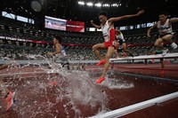 In this May 9, 2021 file photo, Japanese athletes competes the men's 3,000-meter steeplechase during an athletics test event for Tokyo Olympics at the Japan National Stadium in Tokyo. (AP Photo/Shuji Kajiyama)