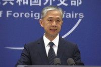 In this June 11, 2021, file photo, China's Foreign Ministry spokesperson Wang Wenbin speaks during the daily briefing in Beijing. (AP Photo/Liu Zheng)