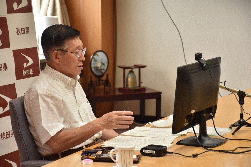 全国知事会で「五輪は無観客で」などと発言する秋田県の佐竹敬久知事=秋田市山王の秋田県庁で2021年7月11日、高野裕士撮影