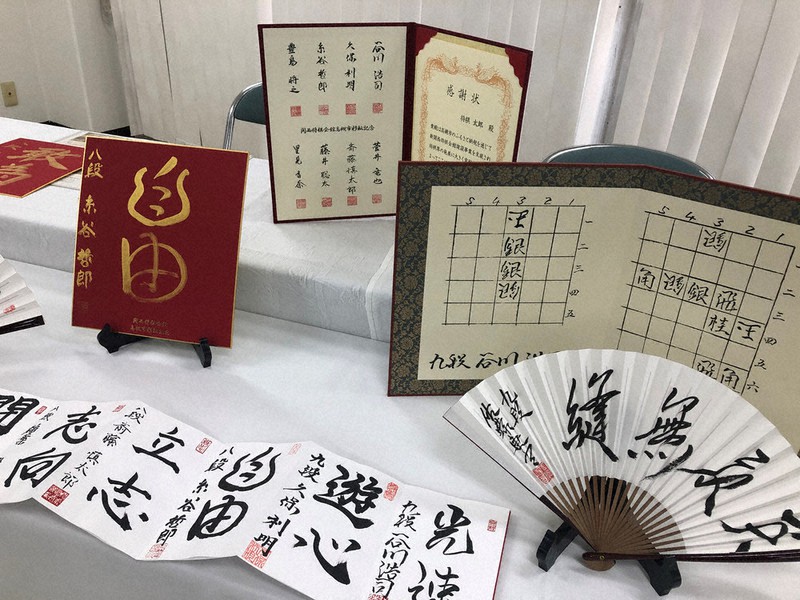100周年記念対局扇子　藤井聡太竜王名人・羽生善治九段 藤井聡太竜王名人と羽生善治九段の揮毫を印刷した 100周年記念