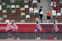 Team United States celebrates after taking the gold medal in final of the men's 4 x 400-meter relay at the 2020 Summer Olympics, Saturday, Aug. 7, 2021, in Tokyo. (AP Photo/Martin Meissner)