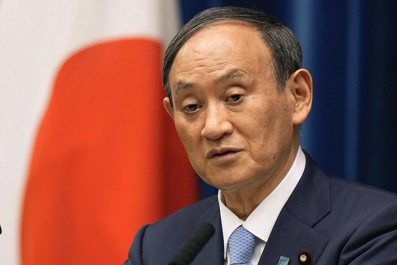 自民党総裁選への不出馬を表明した菅義偉首相=AP