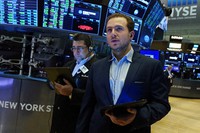 Trader Ben Tuchman, right, works on the floor of the New York Stock Exchange, on Sept. 21, 2021. (AP Photo/Richard Drew)