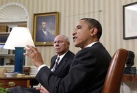 In this Dec. 1, 2010 file photo, President Barack Obama talks with reporters after his meeting with former Secretary of State Colin Powell, left, on the importance of ratifying the New START Treaty, in the Oval Office at the White in Washington. (AP Photo)