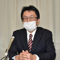 喜びを語る自民党三重県連の津田健児幹事長＝津市の県庁で2021年11月1日、谷口豪撮影