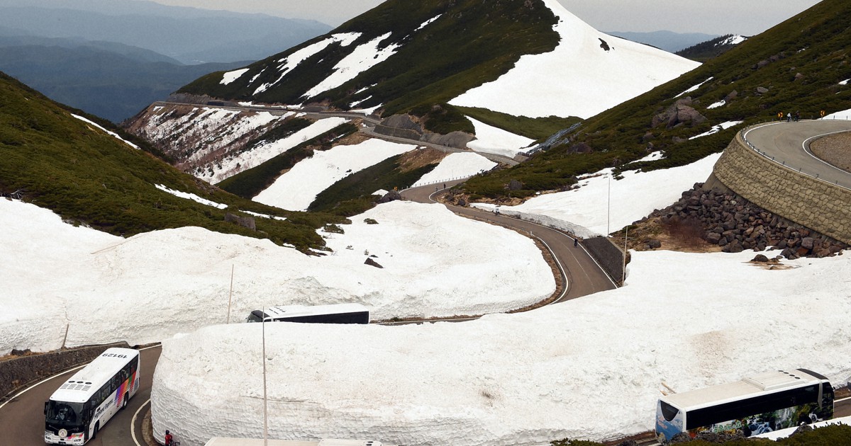 Scenic central Japan road sandwiched between 5-meter-high walls of