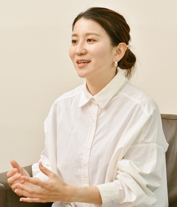 「私自身が欲しいと思っていた商品です」と語る吉田菜々絵さん（東京・京橋の明治本社にて）