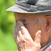 帰還困難区域の避難指示が一部で解除され、自宅跡地を訪れた小泉政一さん（86）。妻・栄子さんは昨年12月に胃がんで亡くなる前、「帰りたい」と言っていた。解除されたが「一緒に帰りたかった。今日お墓に行って、帰れるようになったって報告してきた」と話した＝福島県大熊町で2022年6月30日午前10時46分、前田梨里子撮影