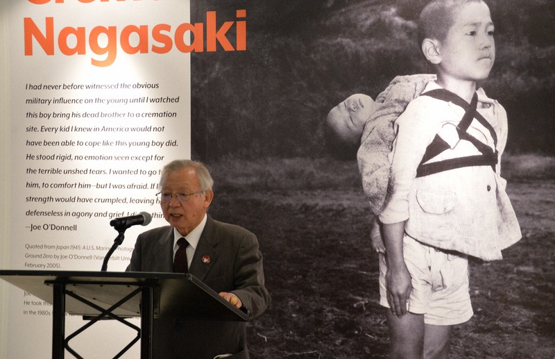 原爆展の開幕式であいさつする日本原水爆被害者団体協議会の木戸季市・事務局長=米ニューヨークの国連本部で2022年8月5日、隅俊之撮影