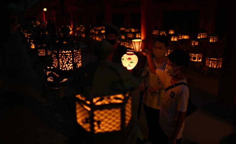 Lanterns light up shrine in Japan's ancient capital Nara during annual