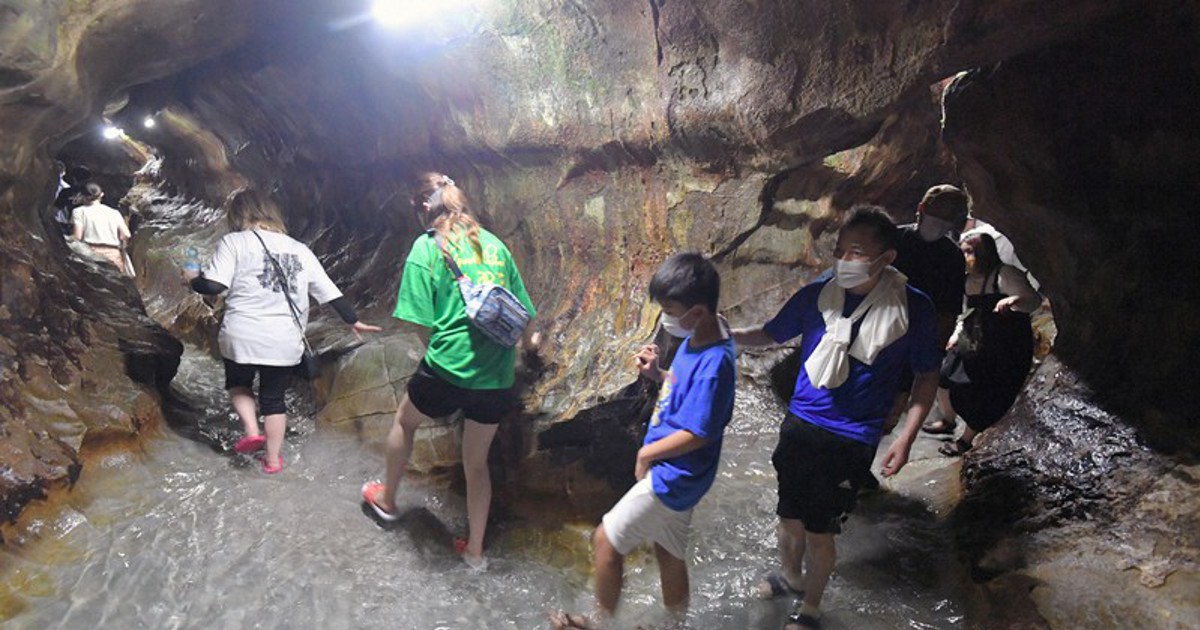 In Photos: Visitors chill out in southwest Japan limestone cave