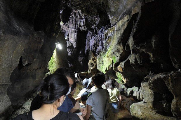 In Photos: Visitors chill out in southwest Japan limestone cave