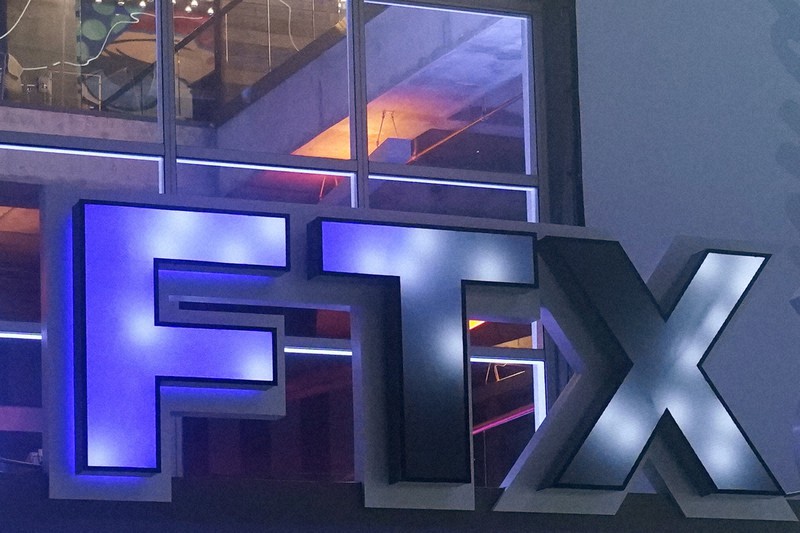 FTXのロゴ=米マイアミで2022年11月12日、AP