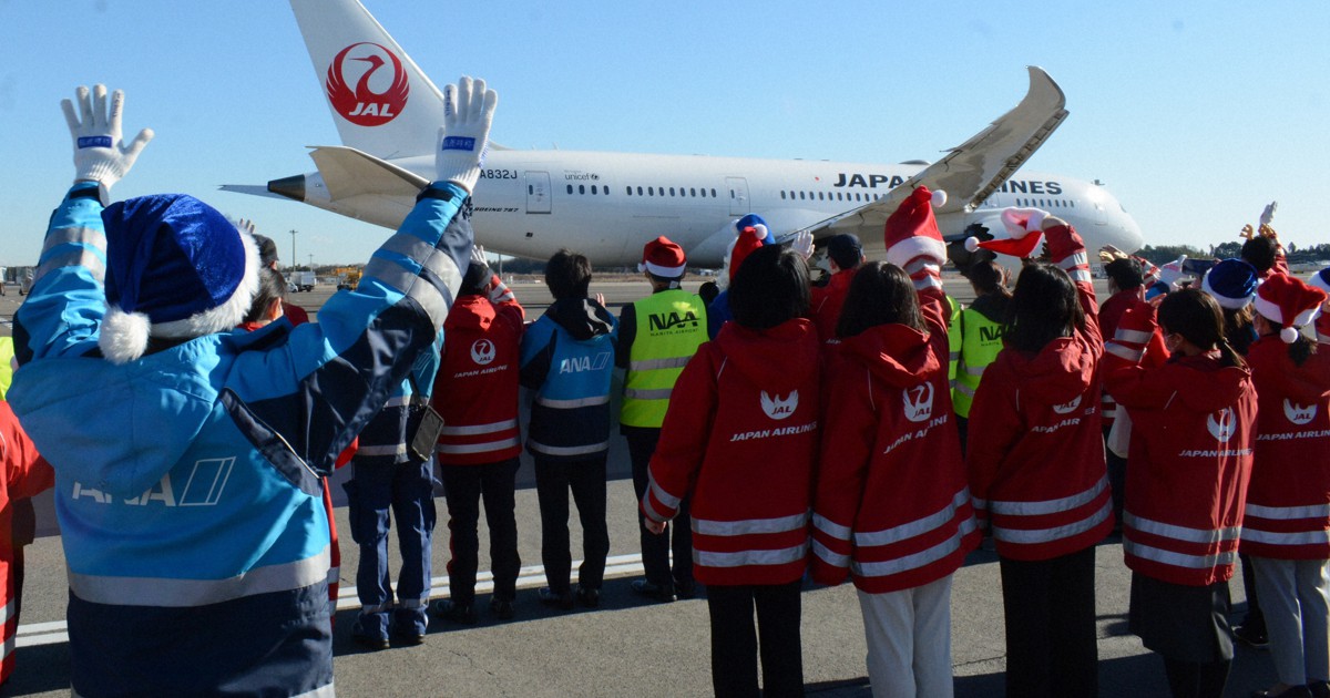 Japan's Narita airport wishes passengers happy holidays in runway send