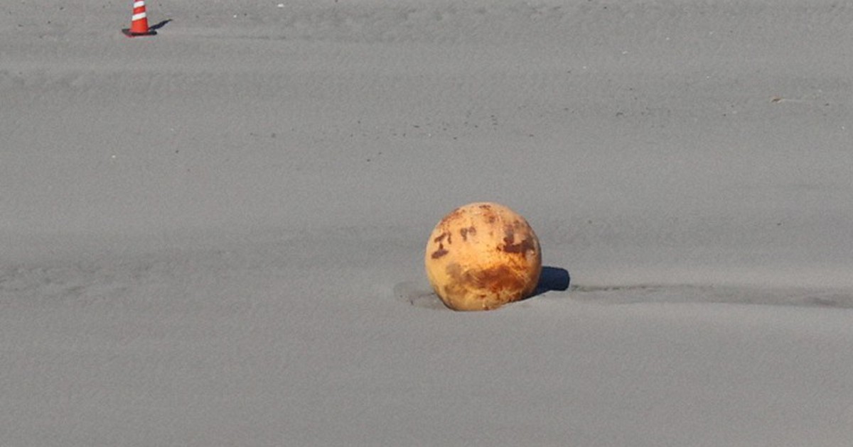 In Photos Metal ball found on Japan beach mystifies authorities The